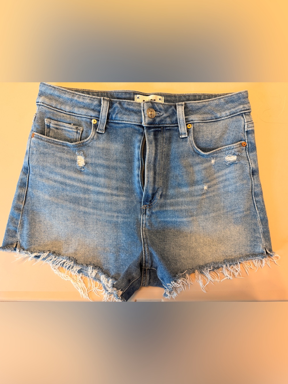 PAIGE Light Blue Distressed Denim Cutoff Shorts